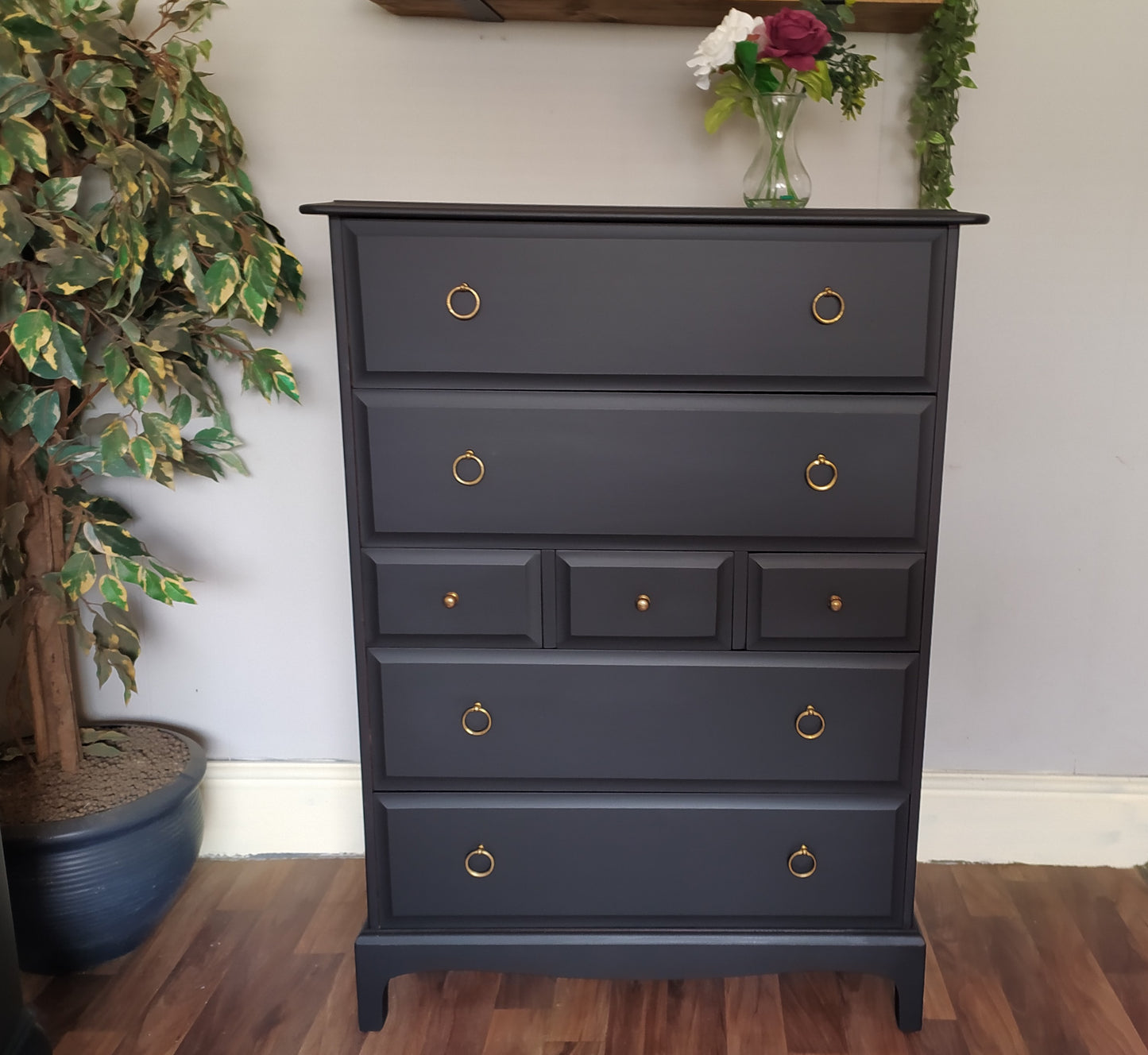 851 : Stag Minstrel Tallboy chest of drawers