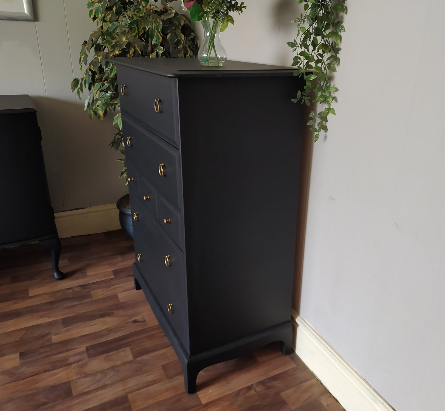 851 : Stag Minstrel Tallboy chest of drawers