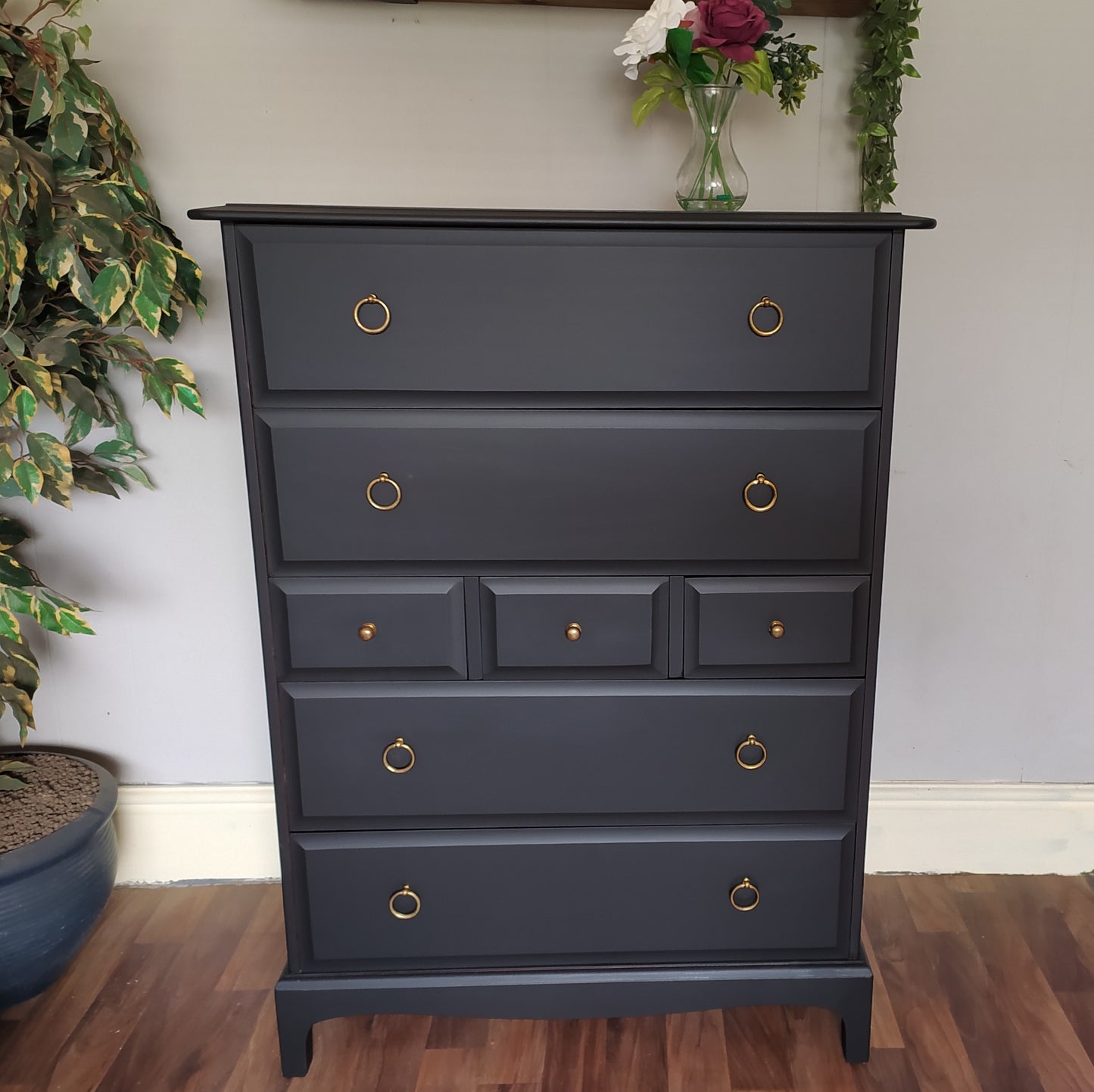 851 : Stag Minstrel Tallboy chest of drawers