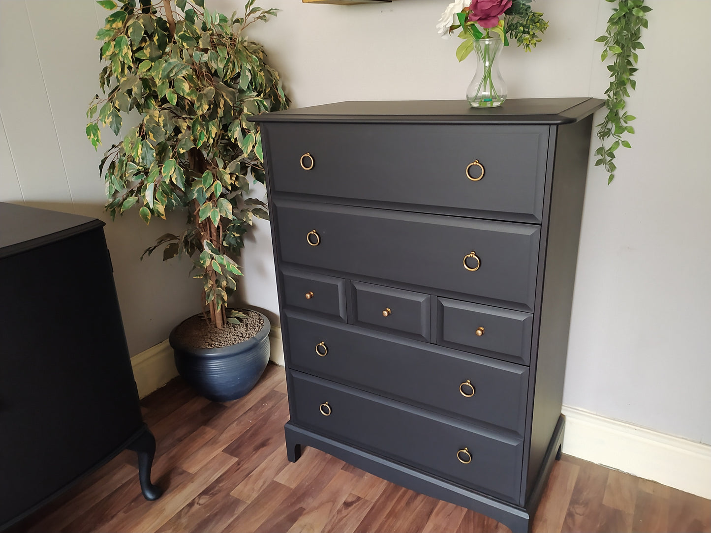 851 : Stag Minstrel Tallboy chest of drawers
