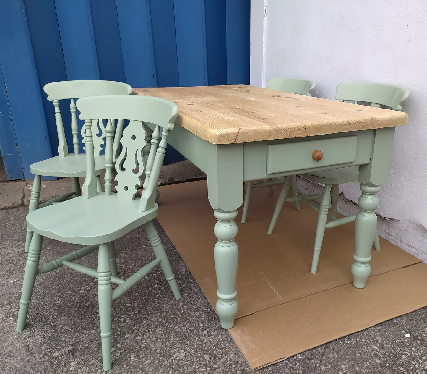 858 : Vintage chunky pine table and four chairs finished in a contemporary green