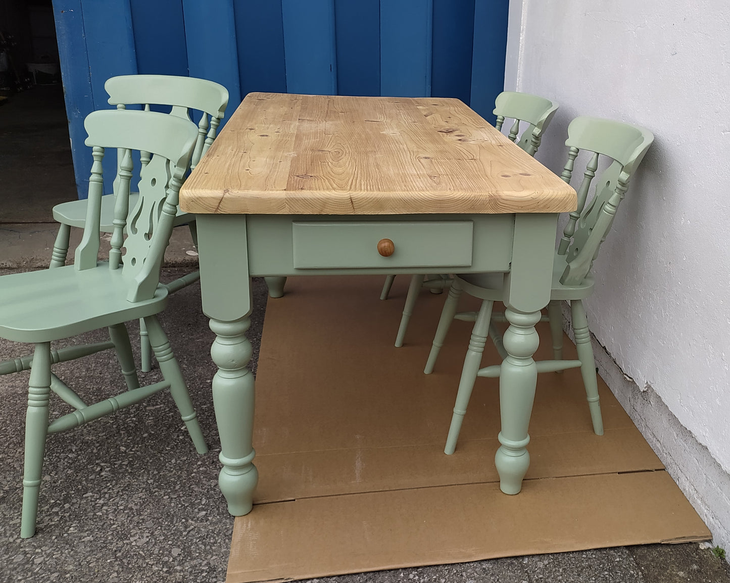 858 : Vintage chunky pine table and four chairs finished in a contemporary green