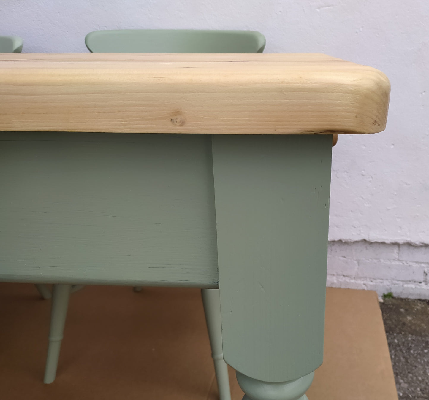 858 : Vintage chunky pine table and four chairs finished in a contemporary green