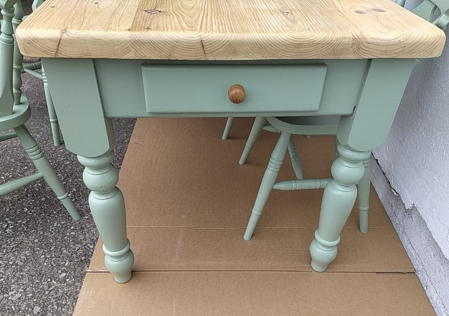 858 : Vintage chunky pine table and four chairs finished in a contemporary green