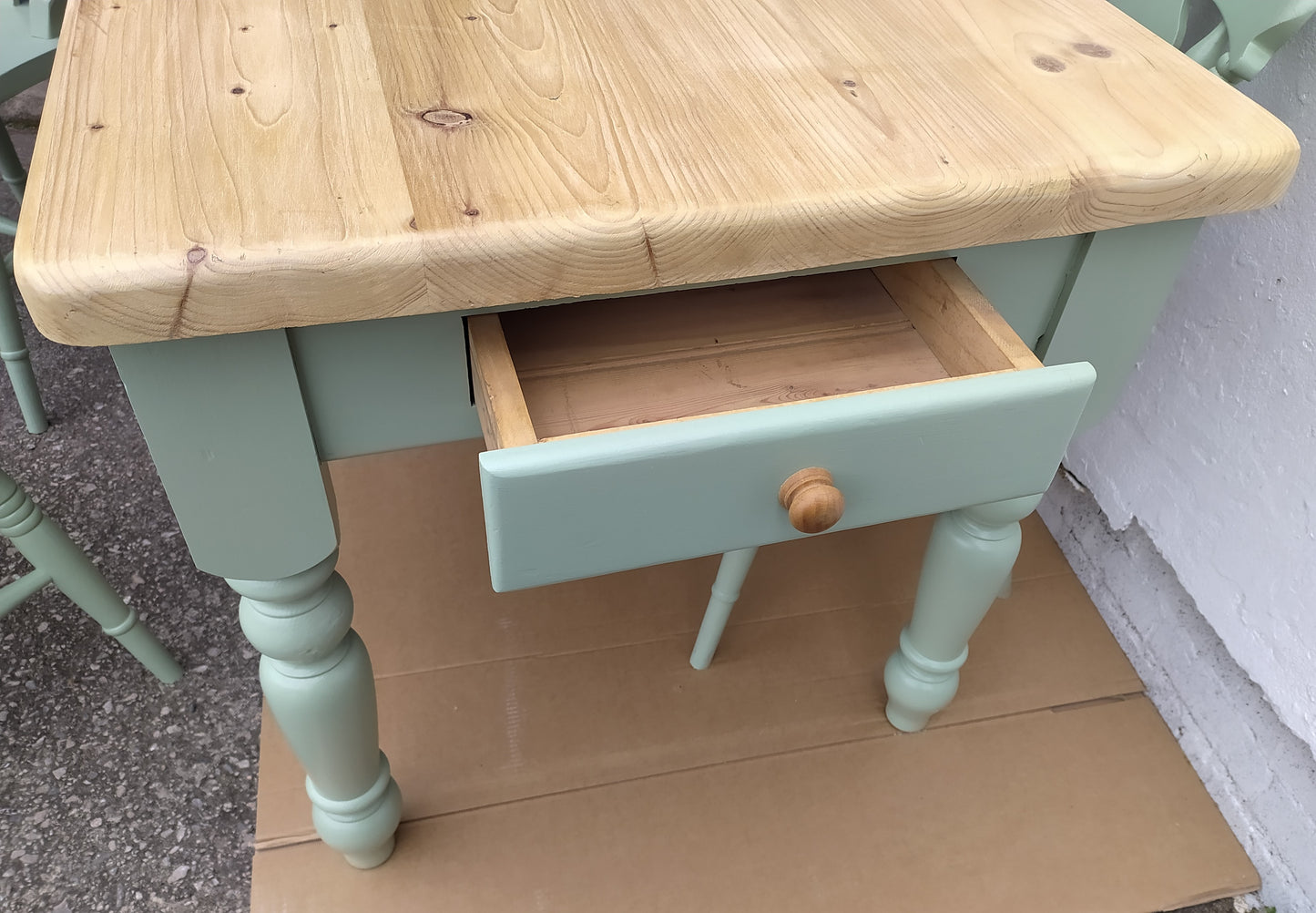 858 : Vintage chunky pine table and four chairs finished in a contemporary green