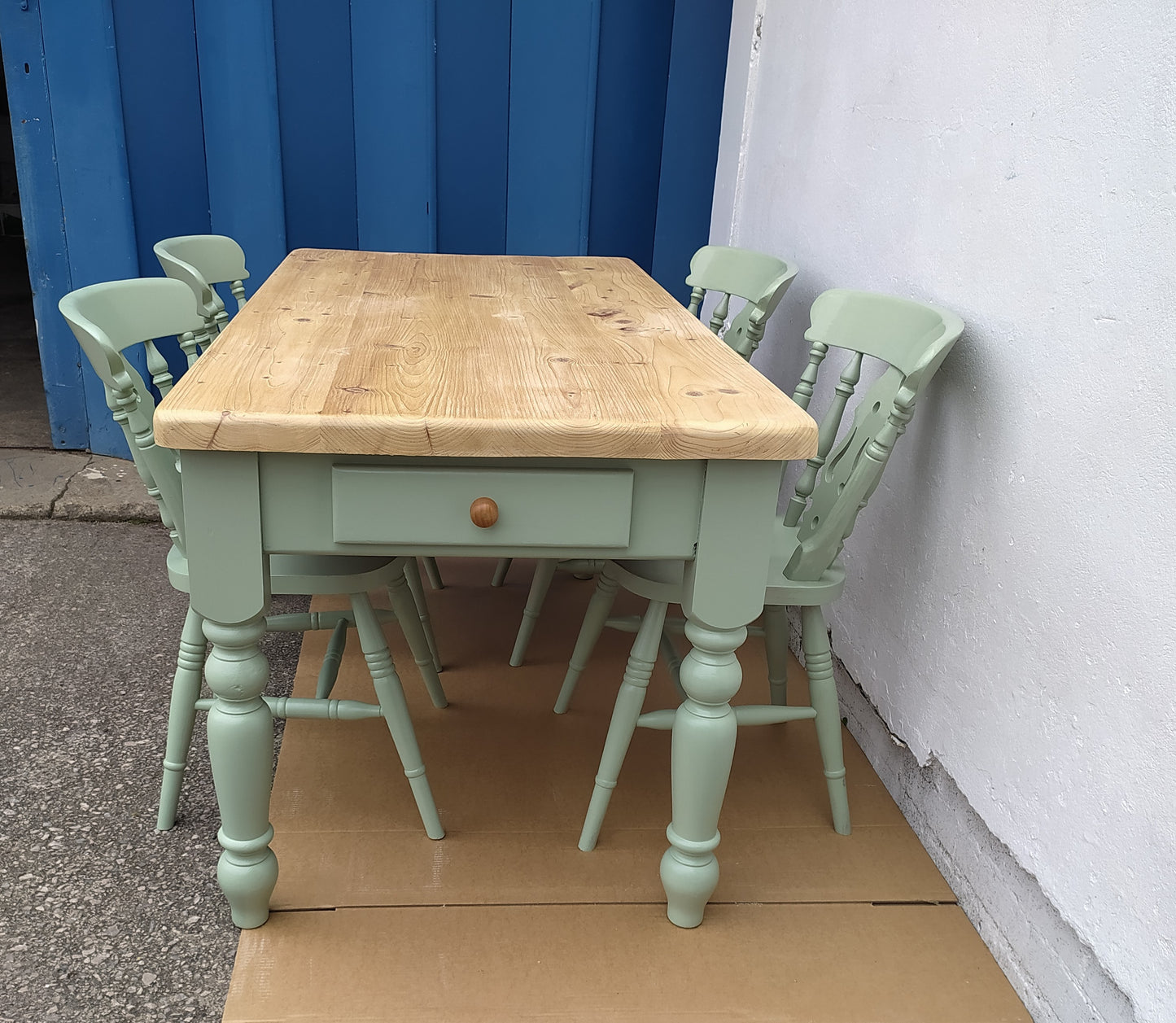 858 : Vintage chunky pine table and four chairs finished in a contemporary green