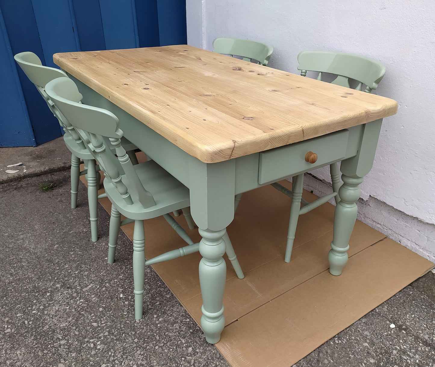 858 : Vintage chunky pine table and four chairs finished in a contemporary green