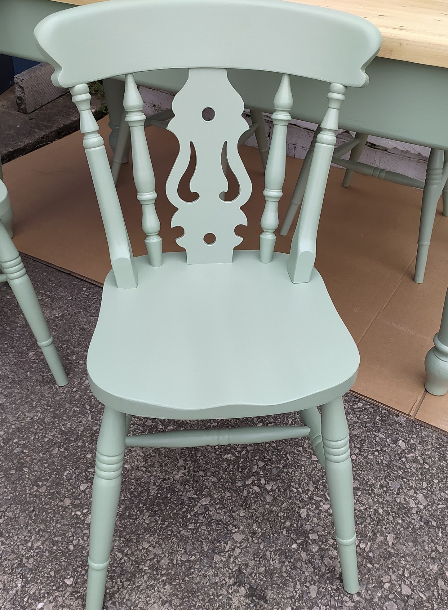 858 : Vintage chunky pine table and four chairs finished in a contemporary green
